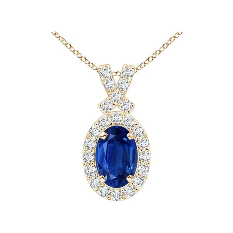 ANGARA Natural 0.60ct Blue Sapphire Pendant with Diamond Halo in 14K Yellow Gold For Sale