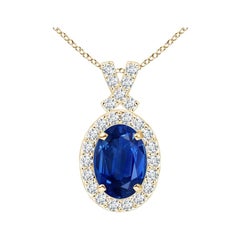 ANGARA Natural 0.85ct Blue Sapphire Pendant with Diamond Halo in 14K Yellow Gold