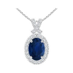 ANGARA Pendentif en or blanc 14 carats avec saphir bleu naturel de 0,85 carat et halo de diamants