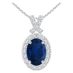 ANGARA Natürlicher 0,85 Karat blauer Saphir-Anhänger mit Diamant-Halo aus 14 Karat Weißgold
