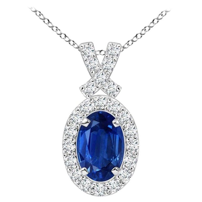 ANGARA Natural 0.60ct Blue Sapphire Pendant with Diamond Halo in 14K White Gold For Sale