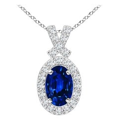 ANGARA Natural 0.60ct Blue Sapphire Pendant with Diamond Halo in 14K White Gold