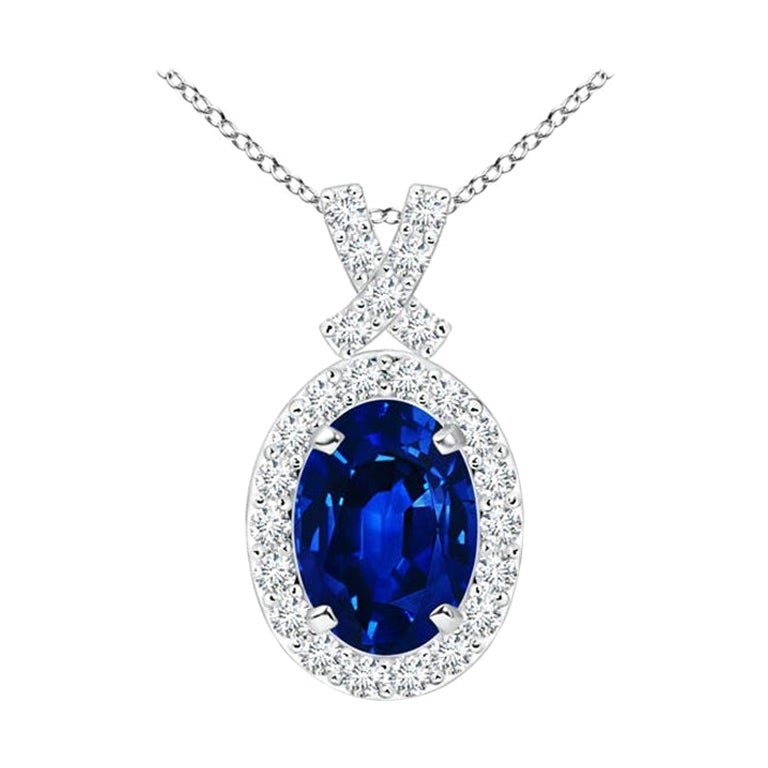 ANGARA Natural 0.85ct Blue Sapphire Pendant with Diamond Halo in 14K White Gold For Sale