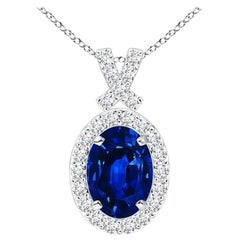 ANGARA Natural 0.85ct Blue Sapphire Pendant with Diamond Halo in 14K White Gold