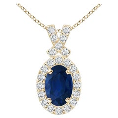 ANGARA Natural 0.60ct Sapphire Pendant with Diamond Halo in 14K Yellow Gold