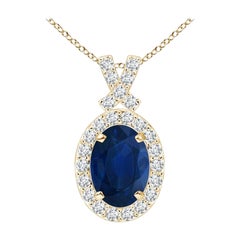 Natural 0.85ct Sapphire Pendant with Diamond Halo in 14K Yellow Gold