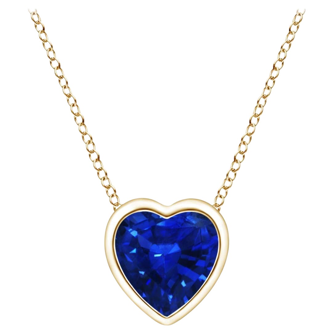 ANGARA Colgante Corazón Solitario Natural 0.30ct Zafiro Azul en Oro Amarillo de 14K en venta