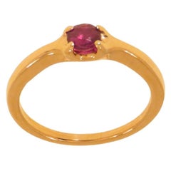 Bague de fiançailles en or rose et rubis