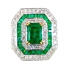 3.10 Carats Emerald and 2.60 Carats Diamond 18K Gold Ring