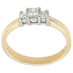 Anillo de diamantes de 3 piedras, engastado con 0,35 ct de diamantes en oro amarillo y blanco de 18 ct