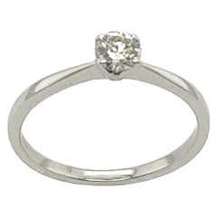 Bague solitaire en or blanc 18 carats sertie de 0,31 carat E/SI1