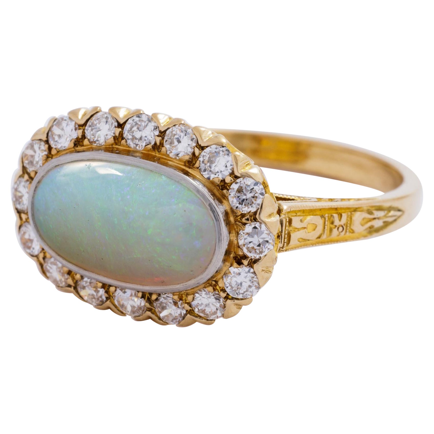 Vintage 14 Karat Yellow Gold and 1.8 Carat Opal Ring with 0.90 Carats Diamonds For Sale