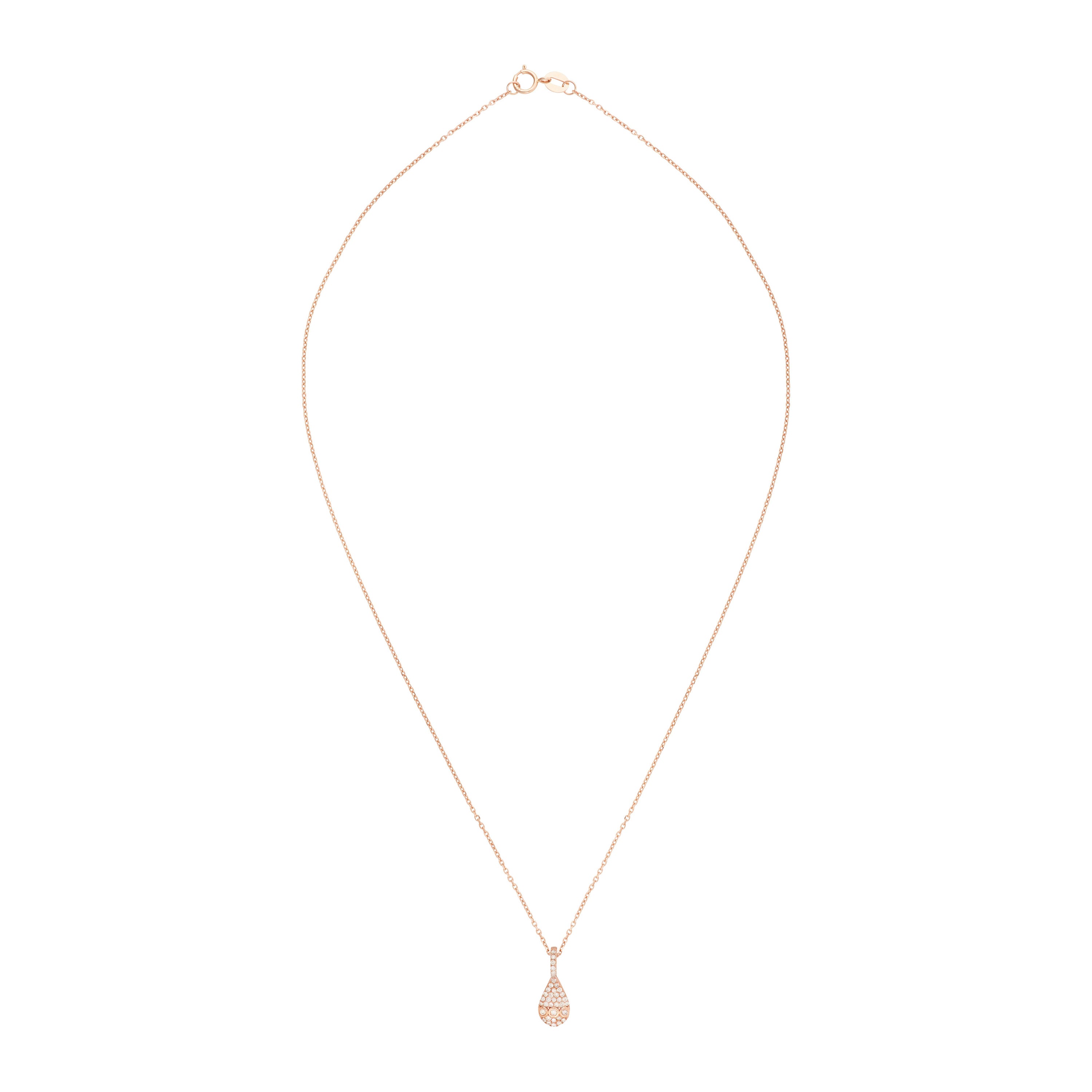 Adorned with a captivating drop silhouette, this dazzling necklace accentuates the beauty of every skin tone, with its sparkling symphony of flattering champagne diamonds set in 18K rose gold. Emanating a soft elegance, like a water droplet catching