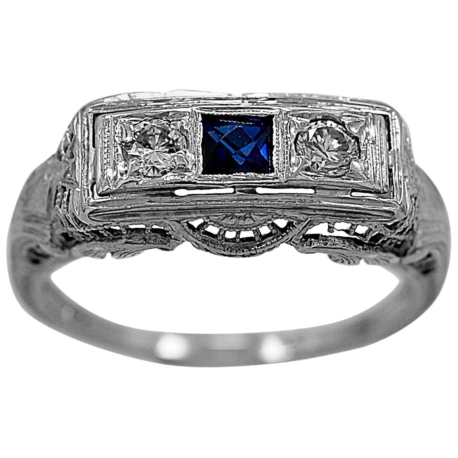 Antique .25 carat diamond sapphire gold engagement ring