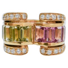 Ring aus 18 Karat Gelbgold mit Peridoten, Turmalin, Diamanten.