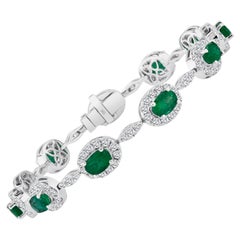 4.63 Carat Oval Cut Emerald and Natural Diamond Bracelet 18K White Gold ref460