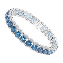 31.33 Carat Step Cut Blue Topaz & 3.10 Carat Natural Diamond Bracelet 18W ref456