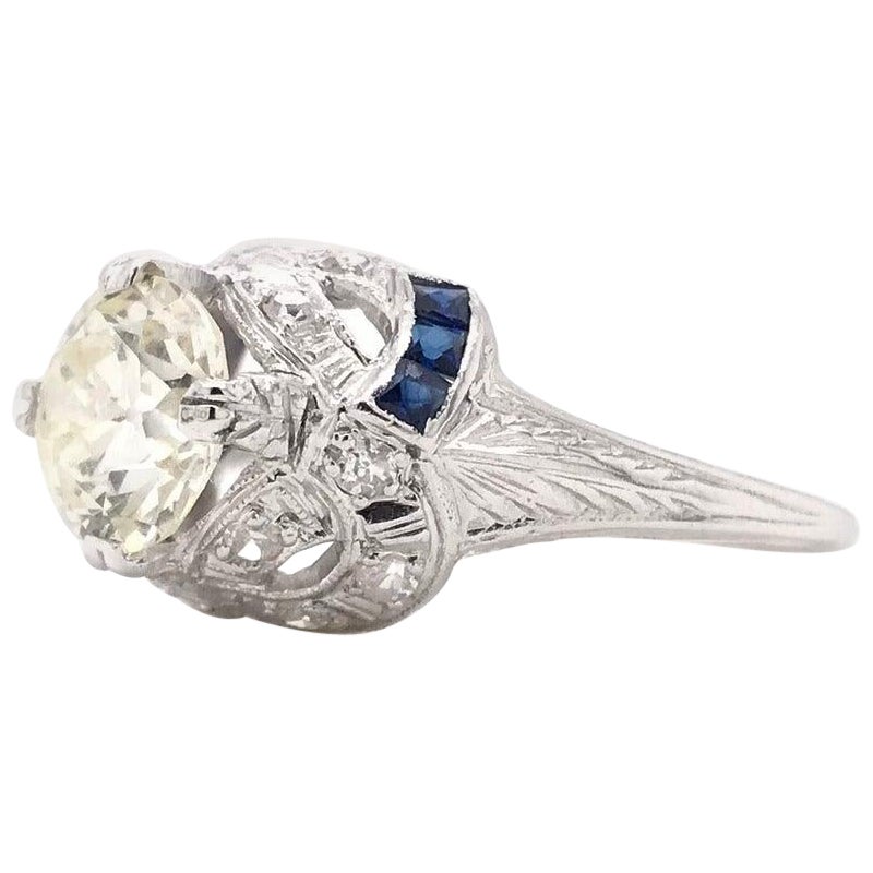 Antique Art Deco 1.50 Carat Diamond and Sapphire Platinum Filigree Ring For Sale