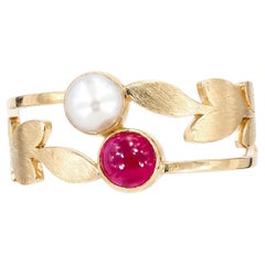Toi and moi ring with ruby and pearl in 14k gold