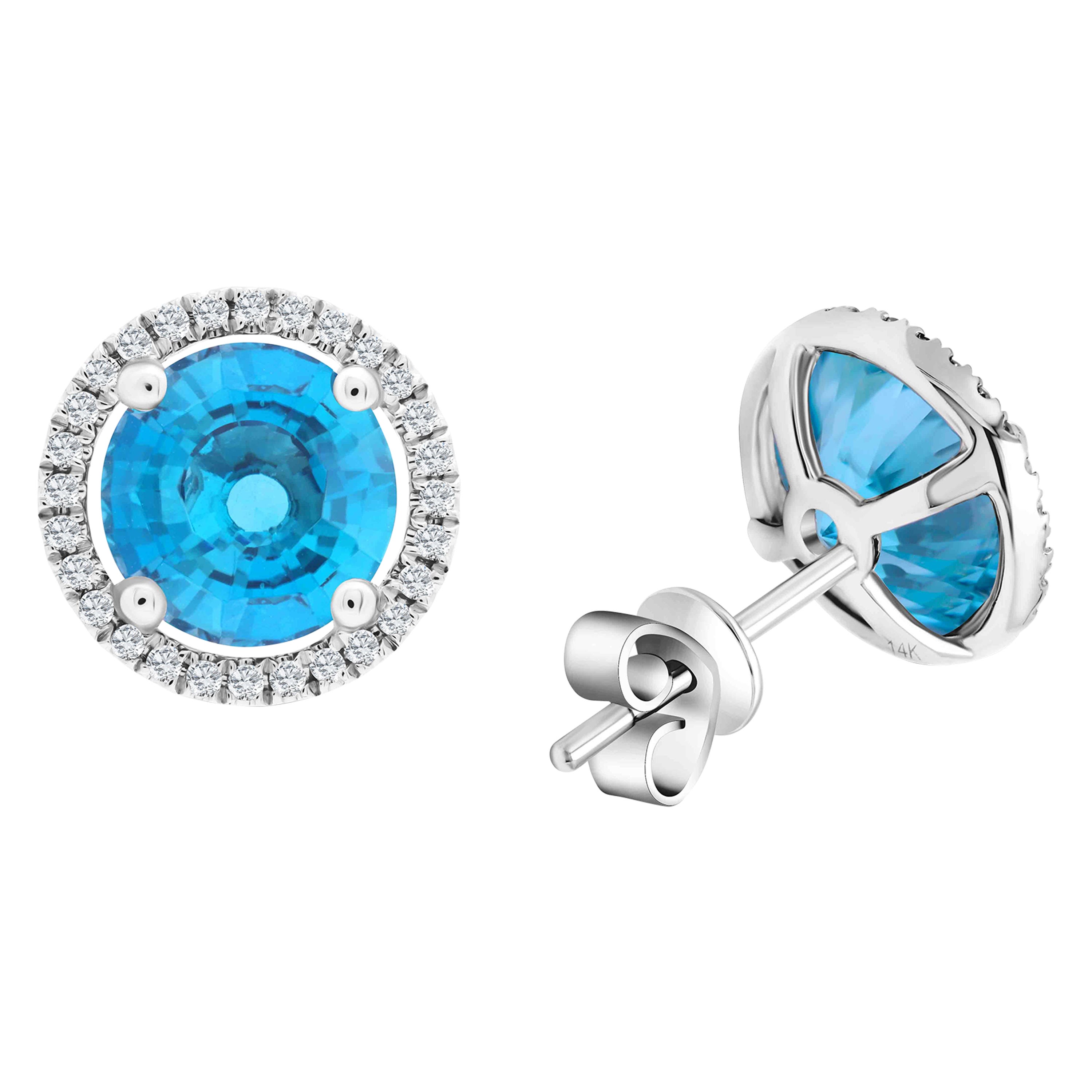 Clous d'oreilles halo de topaze bleue de Londres de 3,58 carats en or 14 carats ref1441 en vente
