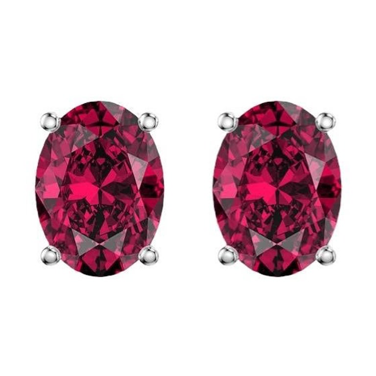 1.1 to 1.20 Ct Oval Gemstone Ruby Stud Earrings - 14K White Gold For Sale