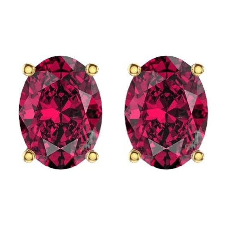 1.1 to 1.20 Ct Oval Gemstone Ruby Stud Earrings - 14K Yellow Gold For Sale