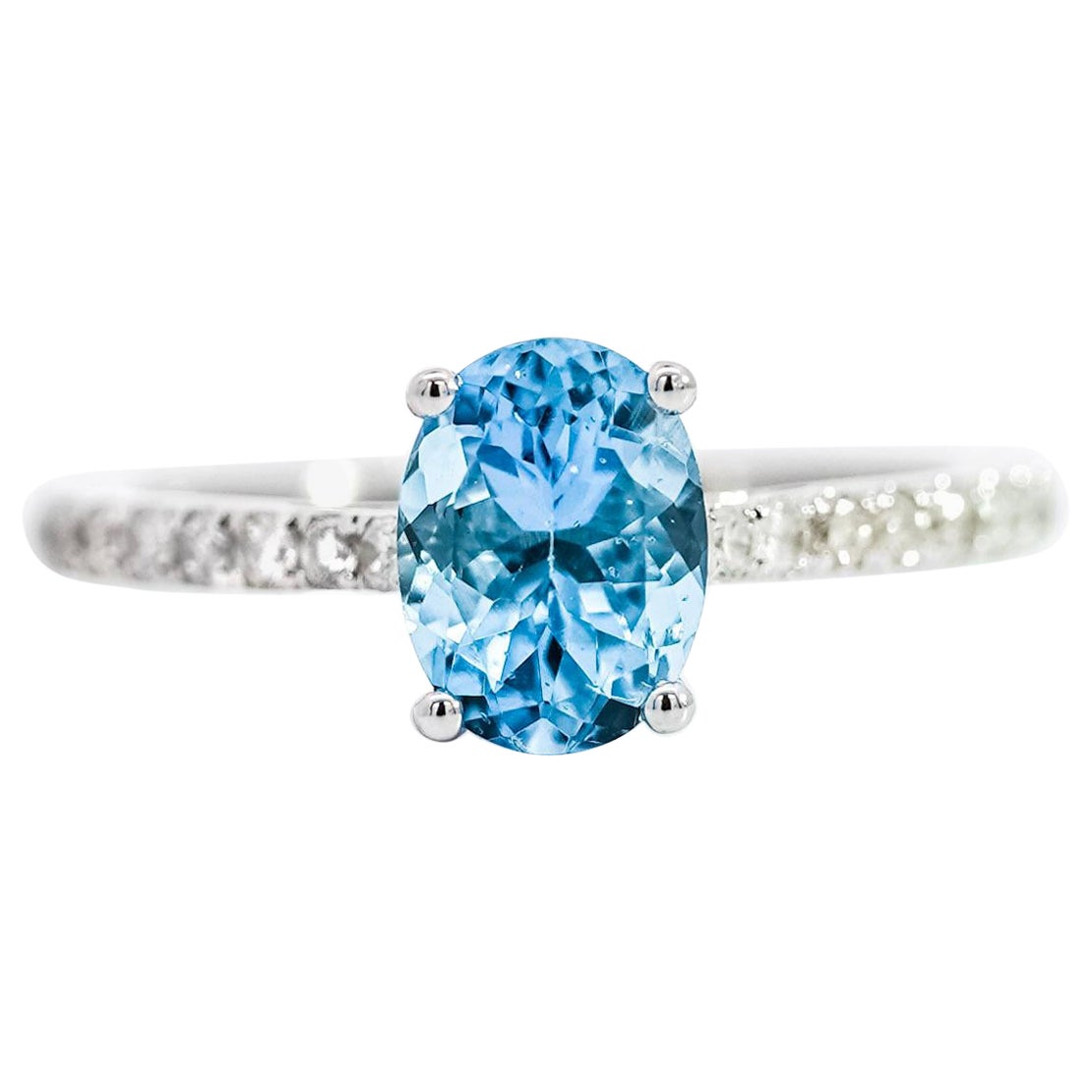 Anillo solitario de oro blanco de 14 quilates con aguamarina y diamantes talla oval de 1,16 quilates