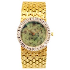 1970er Ebel Uhr mit Jade-Zifferblatt und Diamant-Lünette an einem Goldarmband.