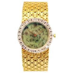 Vintage 1970's Ebel Watch with Jade Dial and Diamond Bezel on a gold bracelet.