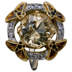 EUGÈNE FEUILLÂTRE An Art Nouveau Gold, Topaz and Diamond Insect Ring circa 1900