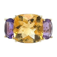 A Yellow Gold, Citrine and Amethyst Ring