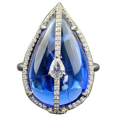 Anillo certificado de tanzanita natural en forma de cabujón de pera con diamante VVS