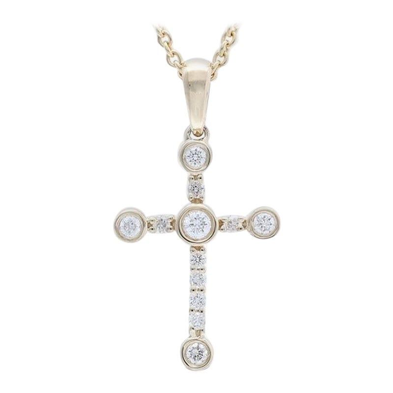 Cross Pendant in 14K Yellow Gold with 0.15 Carat Diamonds For Sale