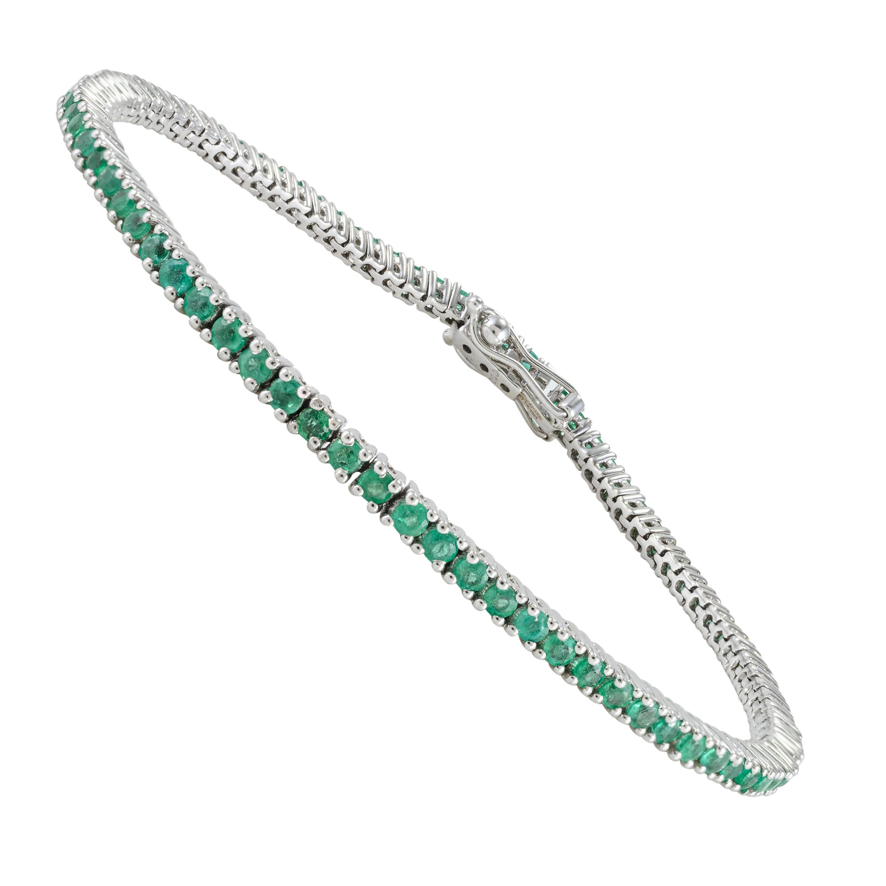 2.1 Carat Dainty Emerald May Birthstone Sleek Tennis Bracelet in 18k White Gold For Sale