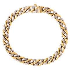 Bracelet chaîne en or blanc et jaune 18 carats