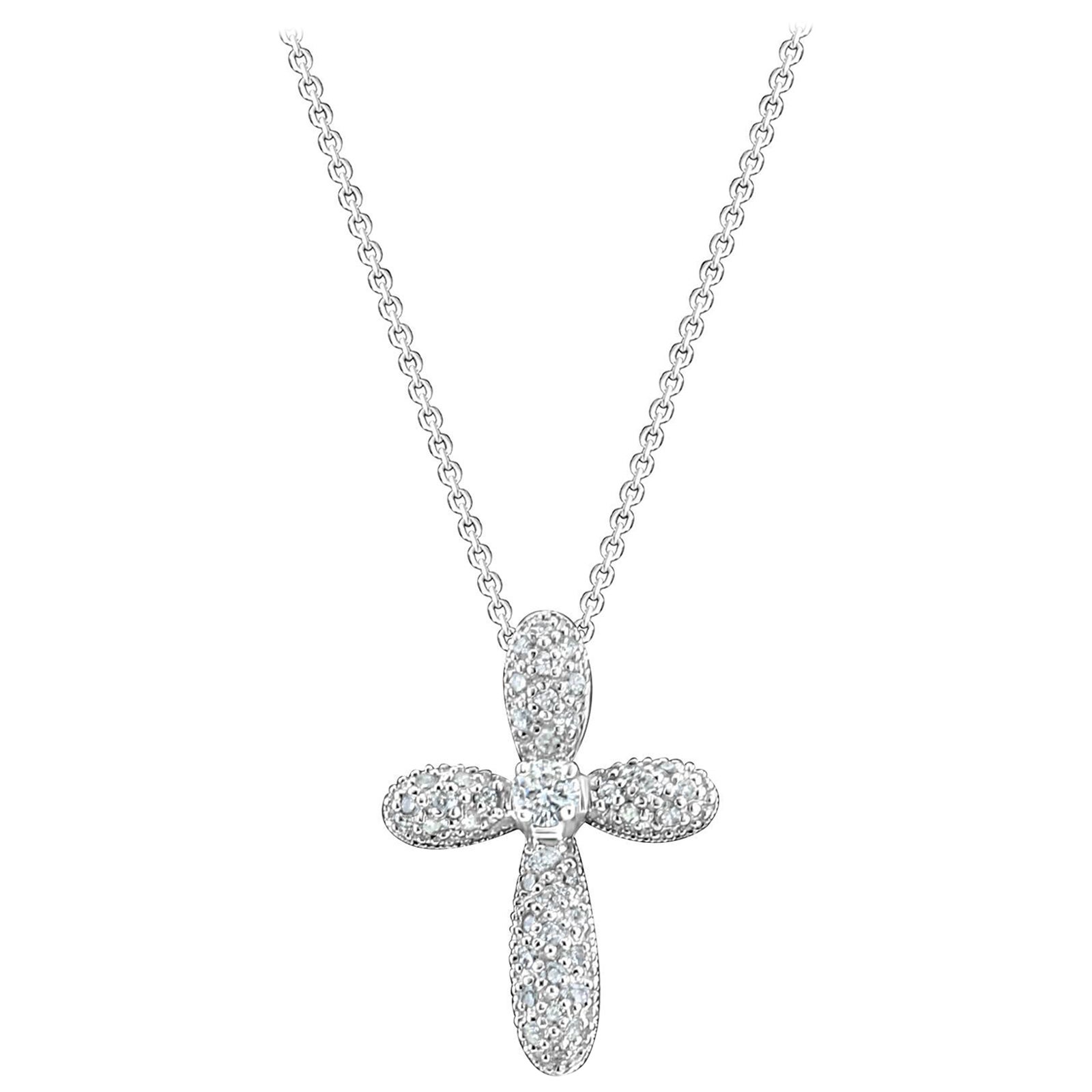 Pendentif croix en diamant pavé naturel .54cttw or blanc 14k en vente