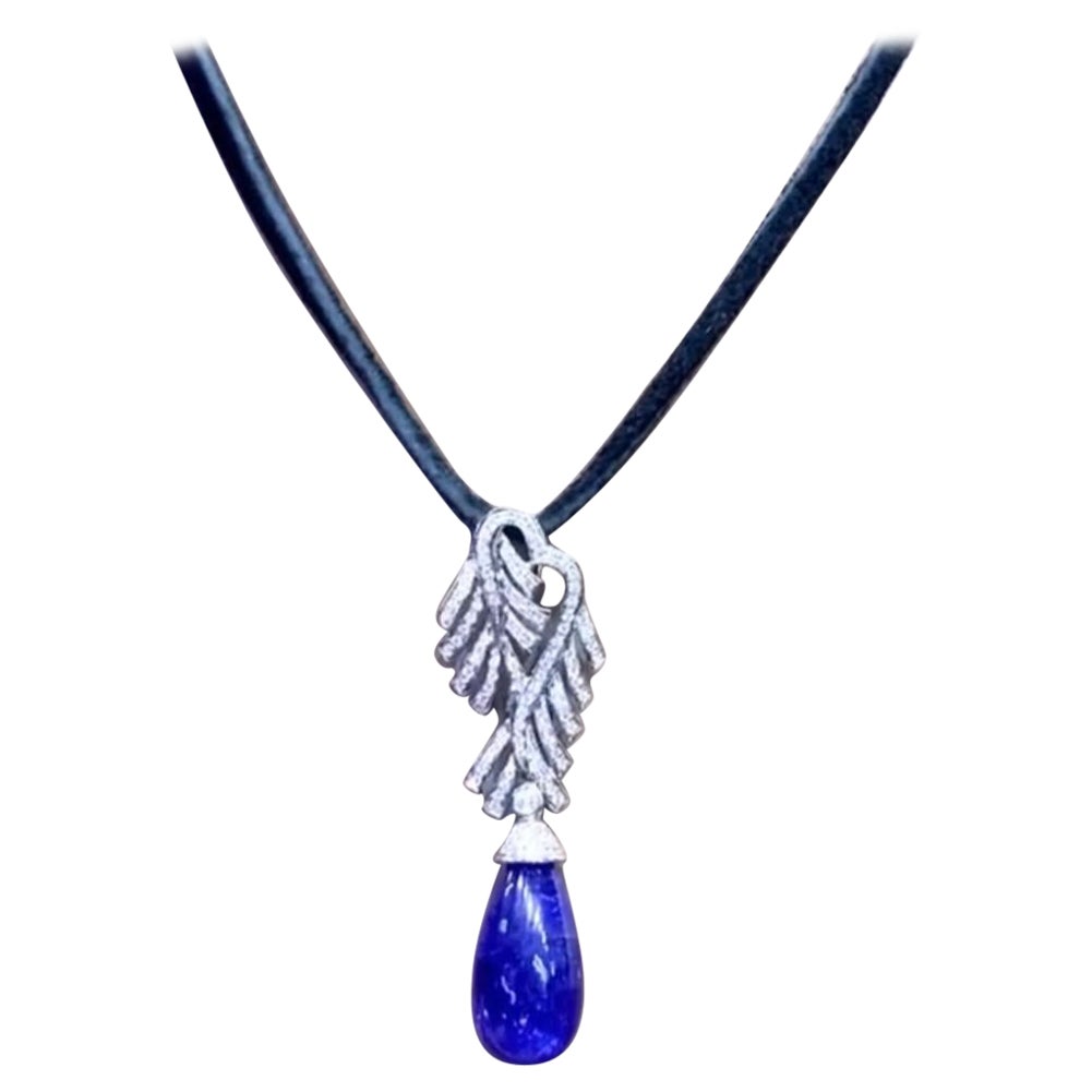 AIG certified 18.20 Ct Tanzanite Diamonds 0.90 Ct 18K Gold Pendant For Sale