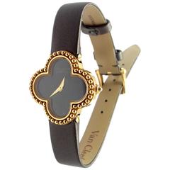 Van Cleef & Arpels Montre femme en or jaune Alhambra Vintage à cadran noir