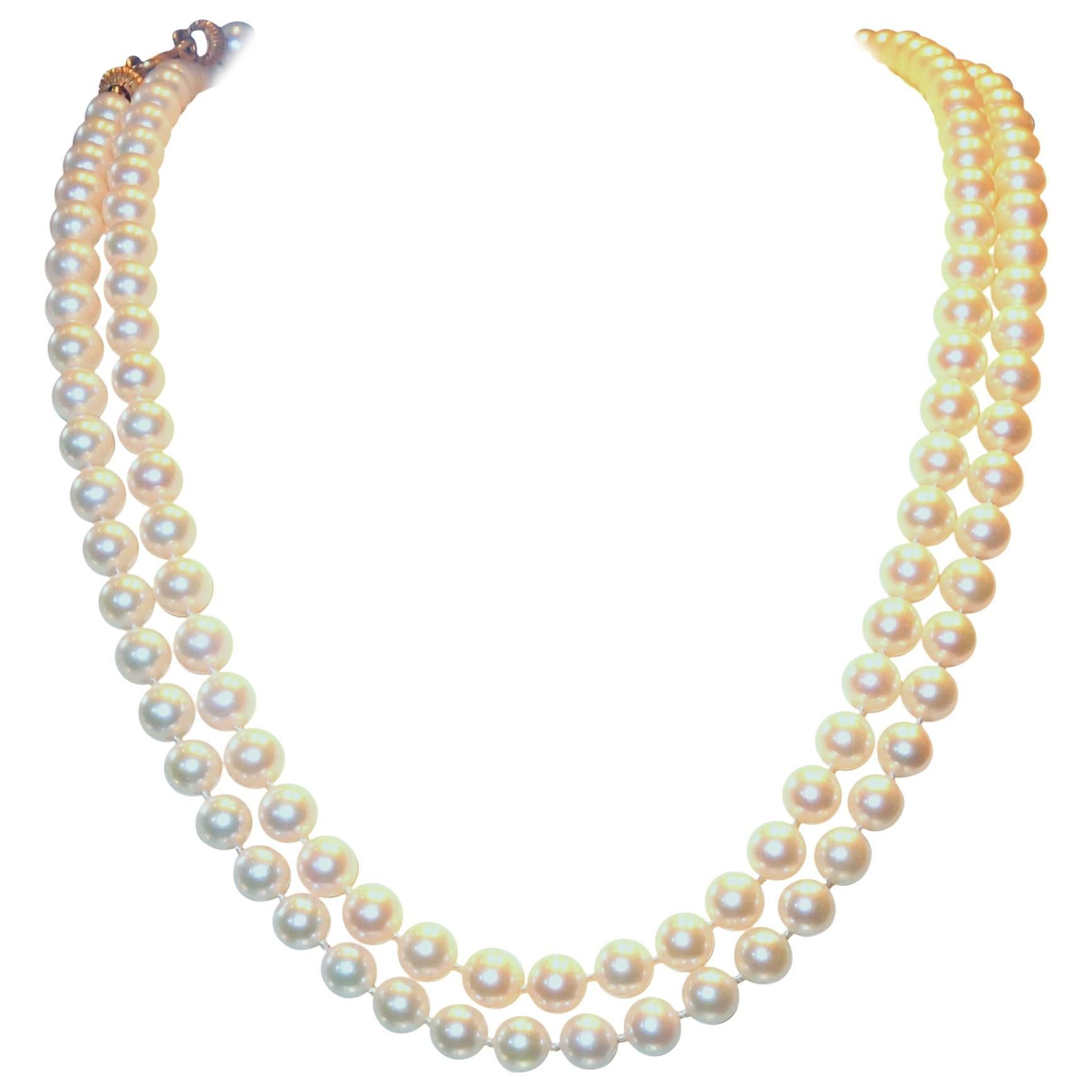 Fine double strand of pearls.