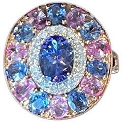 18 K  Cluster-Ring aus Roségold mit Tansanit, rosa Saphir, blauem Saphir und Diamant