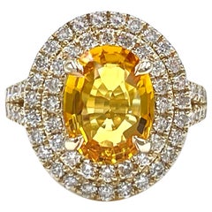 Bague double halo en or jaune 14 carats avec diamants et saphir jaune