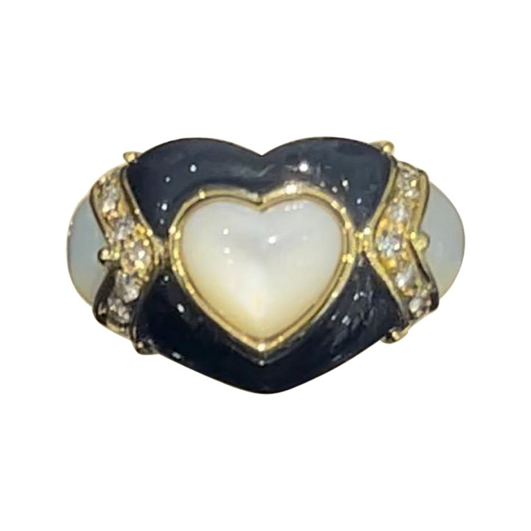 Superbe bague à cœur en onyx, nacre et diamant en 18k