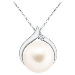 Ciondolo solitario con perla d'acqua dolce coltivata e diamante in oro bianco 14K