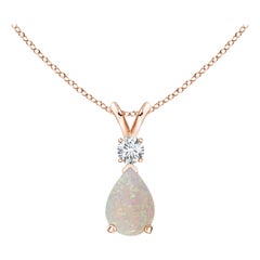 ANGARA Natural 0.42ct Opal Teardrop Pendant with Diamond in 14K Rose Gold