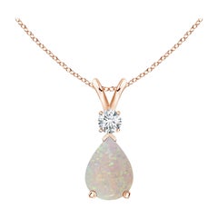 ANGARA Natural 0.70ct Opal Teardrop Pendant with Diamond in 14K Rose Gold