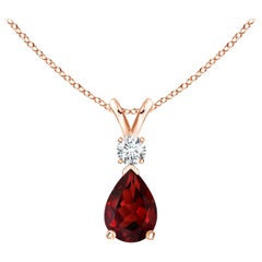 ANGARA Ciondolo a goccia con granato naturale da 0,85 carati e diamante in oro rosa 14K