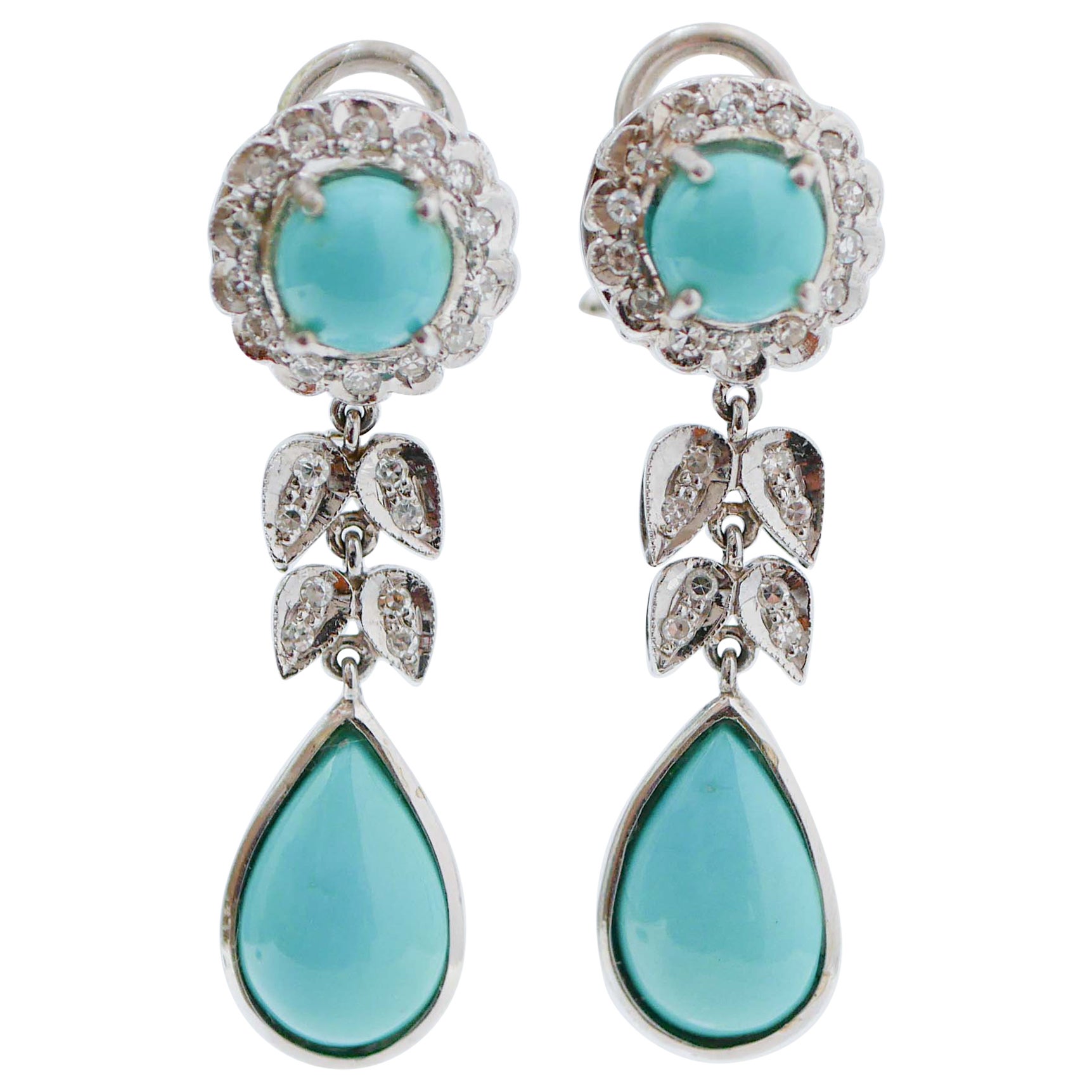 Boucles d'oreilles pendantes en turquoise, diamants et platine
