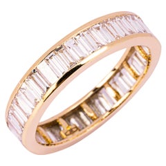 Alex Jona, bague d'éternité en or jaune 18 carats avec diamants blancs taille baguette