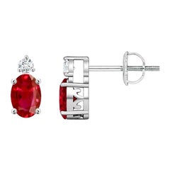 ANGARA Natural Oval 0.50ct Ruby Stud Earrings with Diamond in Platinum
