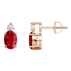 ANGARA Natural Oval 1.20ct Ruby Stud Earrings with Diamond in 14K Rose Gold